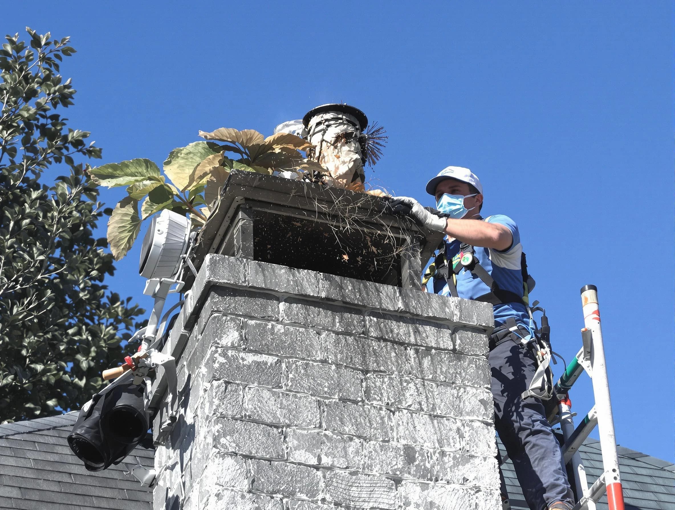 Maricopa Chimney Sweep specialist performing chimney cleaning in Maricopa, AZ